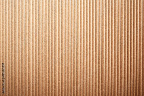 Beige cardboard texture background with vertical lines, creating warm and inviting feel. This material is often used in packaging and crafts, adding natural touch to various projects