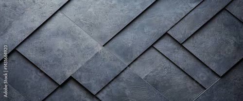 textured surface featuring dark, geometric tiles arranged in modern pattern, creating stylish and contemporary look. design evokes sense of sophistication and elegance