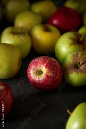 Red and Green Apples on Dark Background