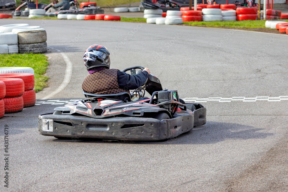 Exciting go-karting adventure on a thrilling racing track during bright afternoon