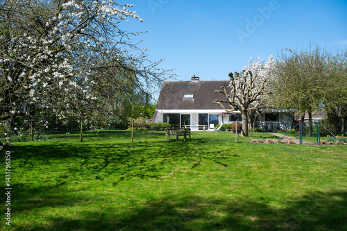 Fotografie Detached house and green backyard meadow in Kortrijk, West Flanders, Belgium