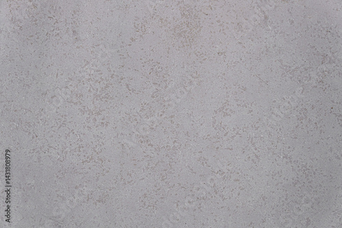 Concrete wall with traces of impacts and cracks. Abstract construction background.