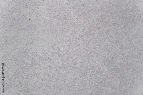 Concrete wall with traces of impacts and cracks. Abstract construction background.