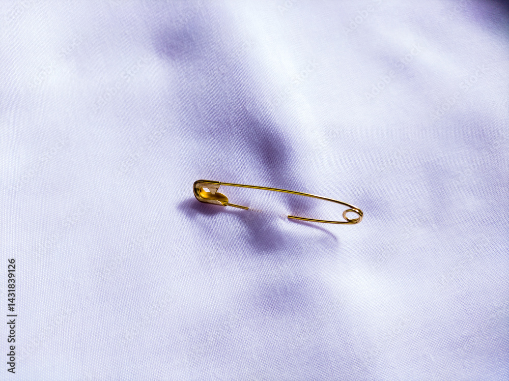 Fototapeta premium safety pins on white background