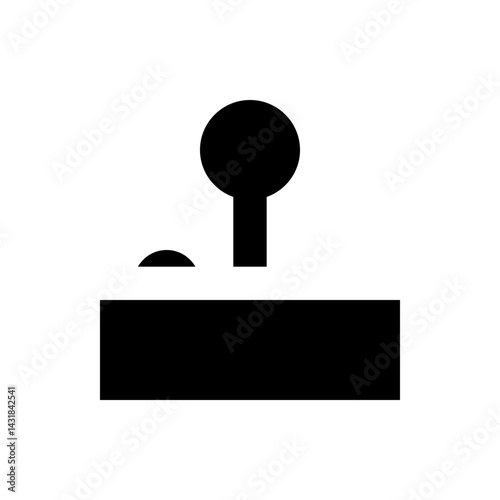 A minimalist graphic of a black joystick with a round top and a small black semicircle nearby in black
