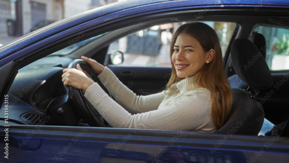 Woman smiling while sitting in a car on an urban street, showcasing a cheerful expression on a bright day, representing a modern city lifestyle with vehicles around.