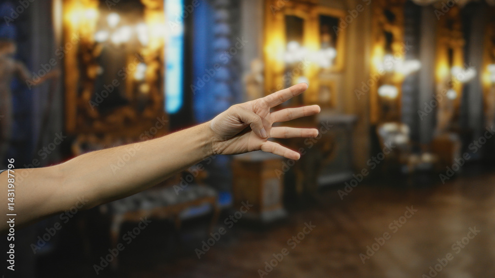 Man's hand showing four fingers indoors in a church, with ornate decor and warm lighting creating a serene religious atmosphere. Man's hand showing four fingers indoors in a church, with ornate decor and warm lighting creating a serene religious atmosphere.