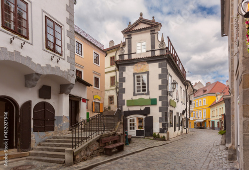 Obraz na płótnie Evening view of a cobbled street with historic buildings in Cesky Krumlov, Czech Republic w salonie