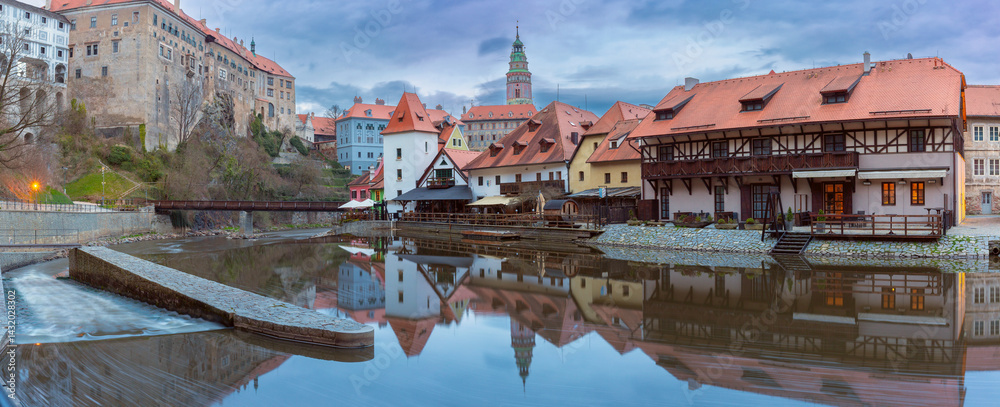 View of historic buildings and riverfront along the Vltava River in Cesky Krumlov, Czech Republic