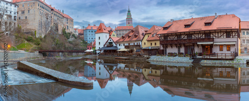 View of historic buildings and riverfront along the Vltava River in Cesky Krumlov, Czech Republic