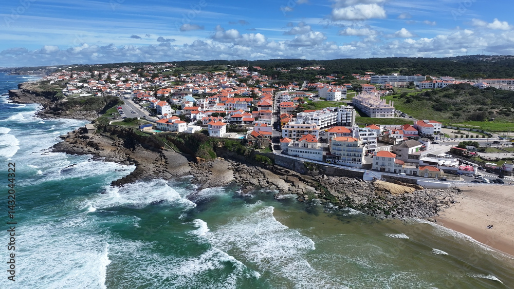 Fototapeta premium Coastal Village At Sintra In District Of Lisbon Portugal. Coastal City. Nature Landscape. Beach Scenery. Coastal Village At Sintra In District Of Lisbon Portugal.