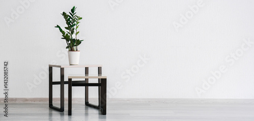 Stylish table with housepla...