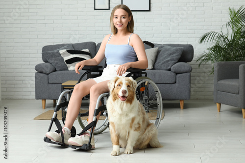 Young woman in wheelchair w...