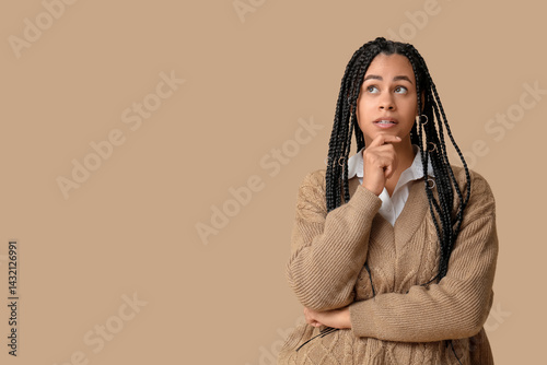 Beautiful young thoughtful ...