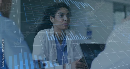 Doctor presenting patient data on tablet while line graphs and pie charts floating around team