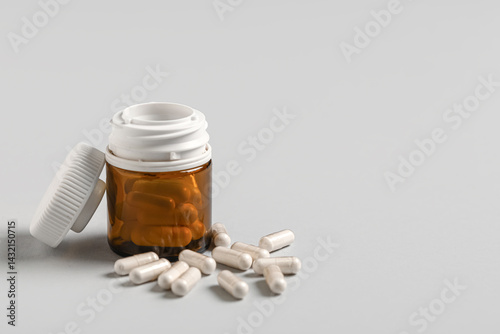 Jar with white hard capsule...