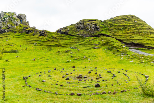 Fairy Glen enchants with lush green hills, mystical shapes, and legendary Viking whispers. A magical, fairy-tale landscape where nature feels alive and ancient stories echo in the wind. Spiral rocks.