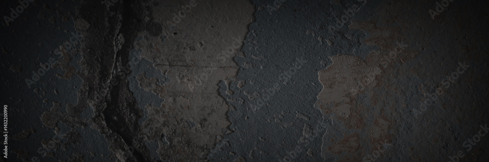 Texture of the old wall. Rough grungy surface of painted plastered concrete wall with spots, cracks, noise and grain. Dark wide panoramic background for design. Shaded vintage texture with vignette.