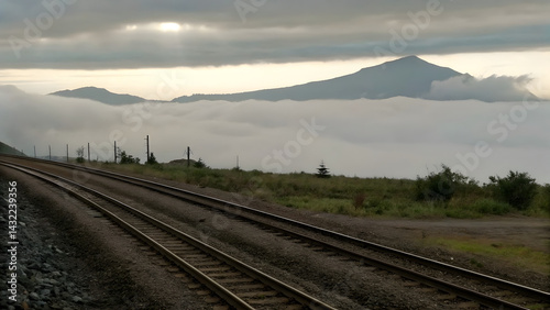 Obraz na płótnie Tracks winding into the clouds w salonie