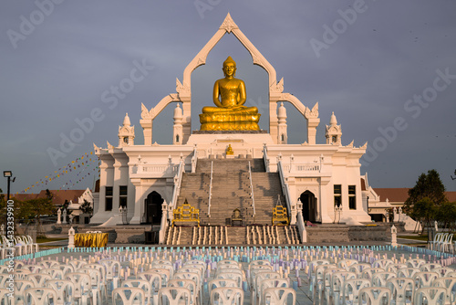 Lopburi, Thailand, April 12, 2025, Golden Buddha statue at Puttha  Sathan Lopburi, Welcomes visitors during a serene afternoon in April