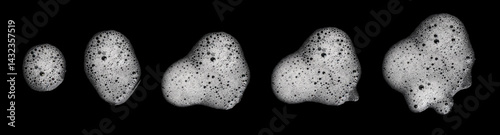 Top view set white foam soap isolated on a black background. concept of shampoo bubble, suds texture bathtub. shaving cream gel, bath lather. foam bubble