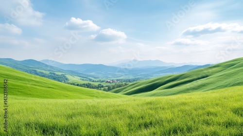 Lush green hills, rolling landscapes, and a tranquil valley under a vibrant blue sky