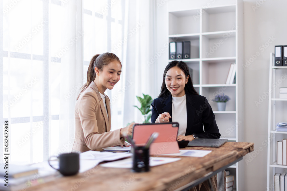 Asian company employees and colleagues work together in the office. Doing accounting analysis report real estate investment data, Financial and tax systems concept.
Asian company employees and colleagues work together in the office. Doing accounting analysis report real estate investment data, Financial and tax systems concept.