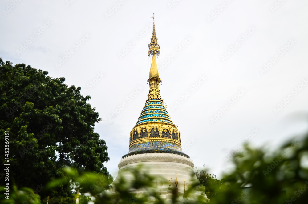 Naklejka premium Pagoda and Chapel, Lanna Architecture, Symbols of Buddhism, South East Asia at Wat Buppharam, Chiang Mai, Northern Thailand