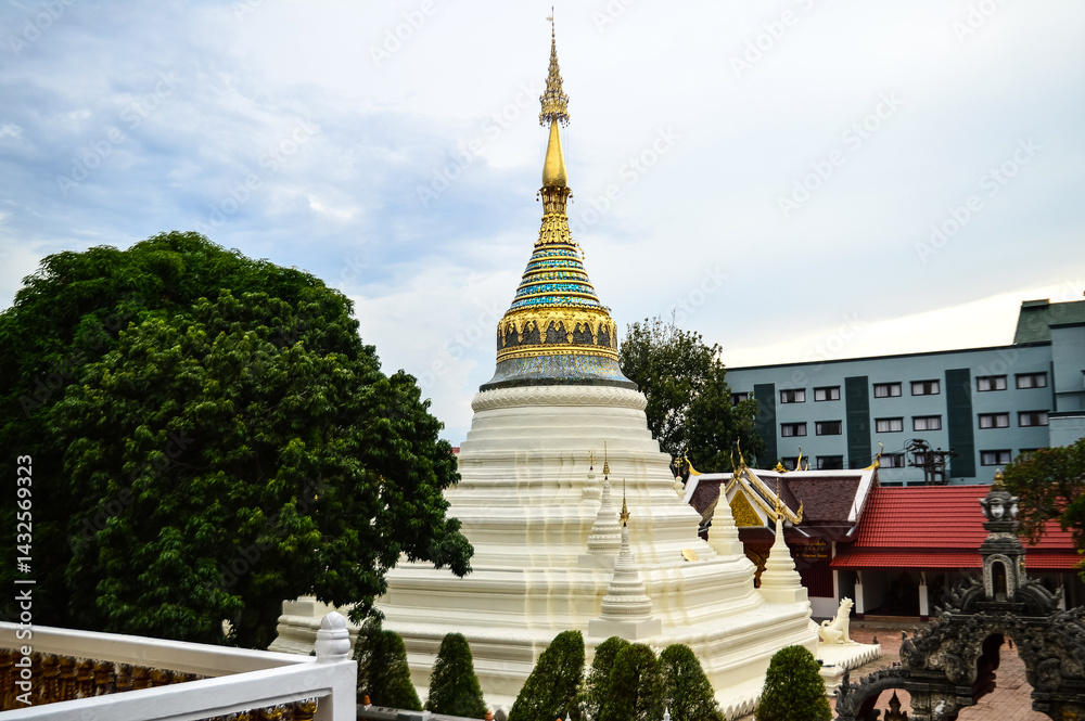 Naklejka premium Pagoda and Chapel, Lanna Architecture, Symbols of Buddhism, South East Asia at Wat Buppharam, Chiang Mai, Northern Thailand