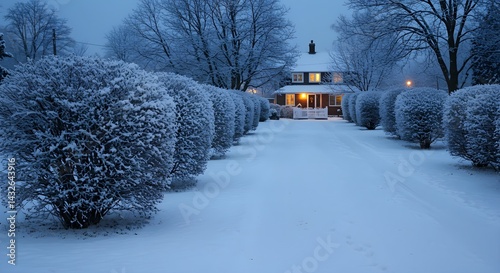 Obraz na płótnie A cozy house on a snowy evening, the light from the windows glowing warmly against the winter wonderland. w salonie