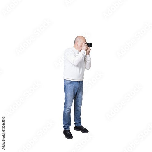 a man standing with a camera in his hands