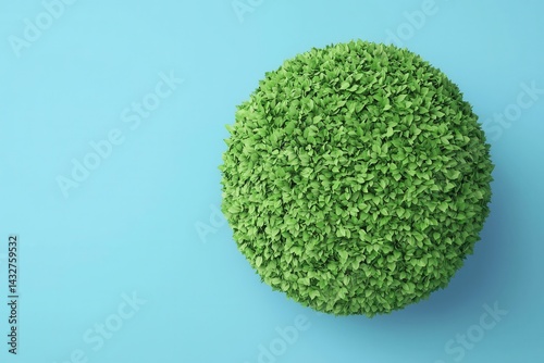 Green Sphere of Leaves on a Bright Blue Background for Nature Themes