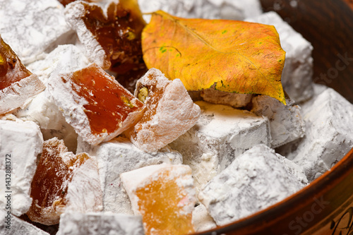 Obraz na płótnie Sweet food Turkish delight on wooden background, assorted locum and candy for decorated backdrop w salonie