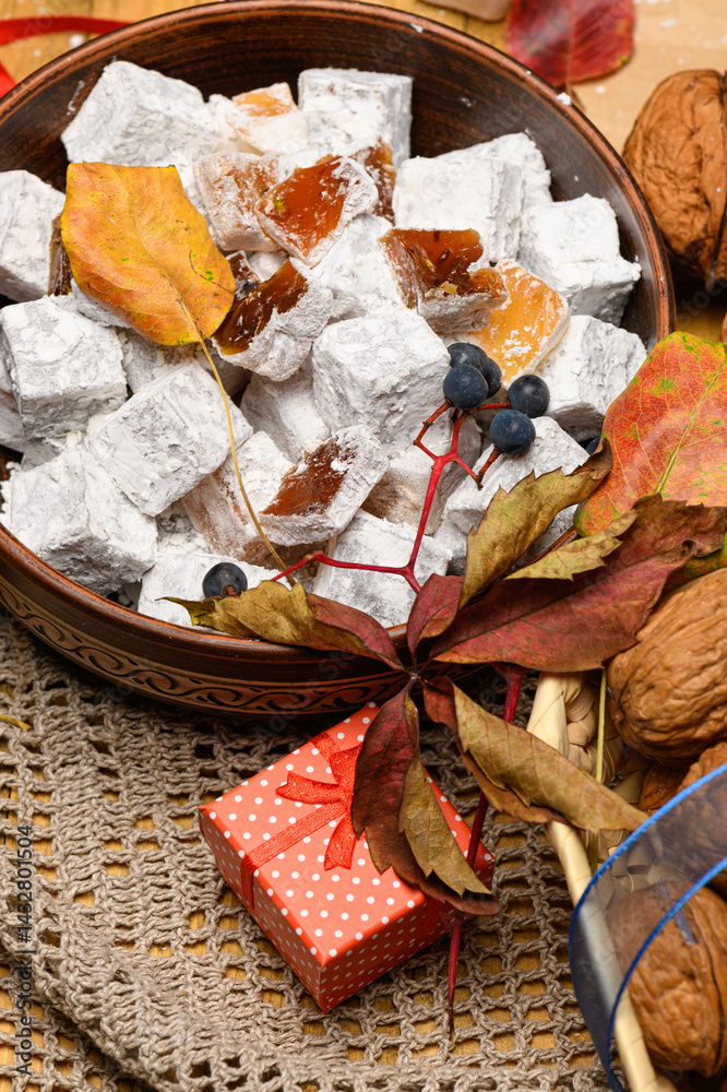 Sweet food Turkish delight on wooden background, assorted locum and candy for decorated backdrop