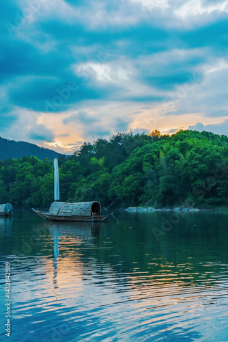 Mountains, Oujiang River, fishing boats, and ancient towns in Lishui City, Zhejiang Province, China On May 24th, 2024	