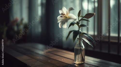 White Lily in a Small Glass Vase