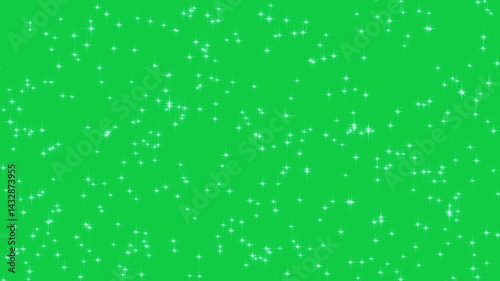 Abstract glowing particles of fall shiny twinkling glitter stars. Shiny sparkle rain. Chroma key - Green screen.  Background New Year and Christmas. Seamless loop