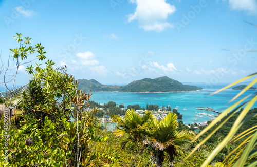 Scenic midday view from a tropical hilltop on Praslin Island, Seychelles