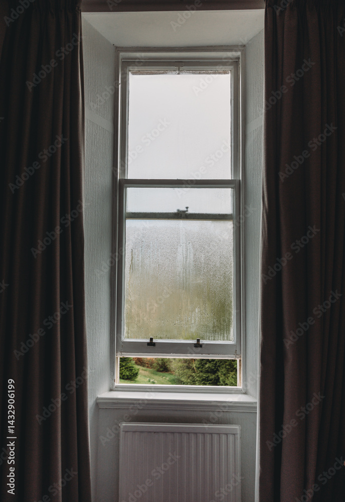 steamed old fashioned sash tall window