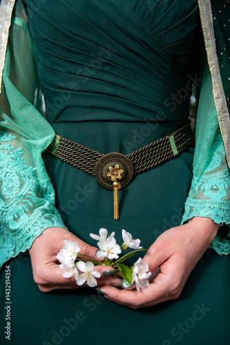 Bild auf Leinwand Spring green dress abstract, cherry blossom in hands