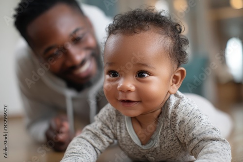 Baby Crawling Near Smiling Man
