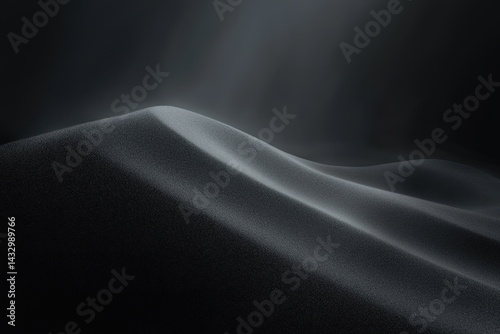 Fototapeta Naklejka Na Ścianę i Meble -  Silhouetted dune form, illuminated from above, creating soft light.