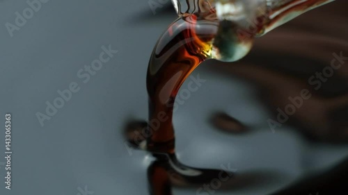 Stream of Soy Sauce Macro Slow Motion