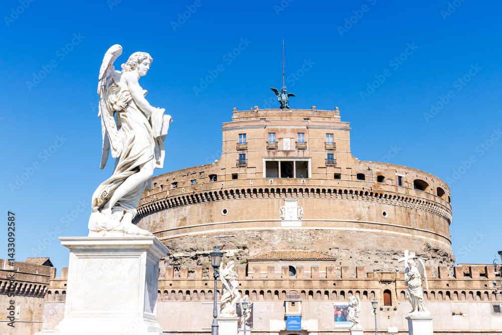 Historic Castel Sant'Angelo with ancient statues on Ponte Sant'Angelo in Rome, Italy
