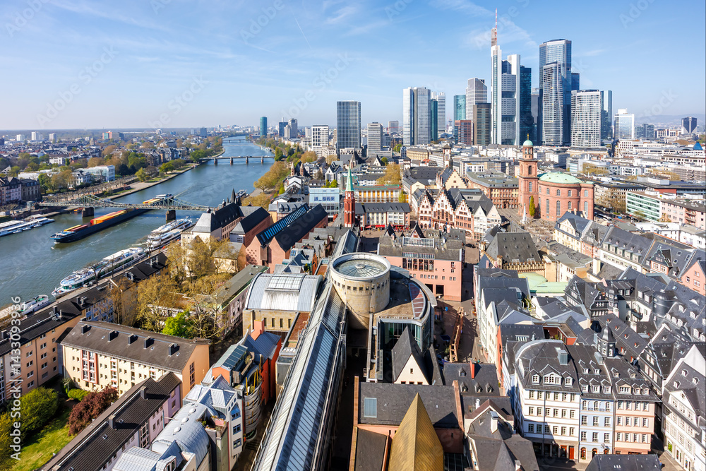 Frankfurt skyline skyscrapers in city center with the Römer and Main river from above in Frankfurt, Germany