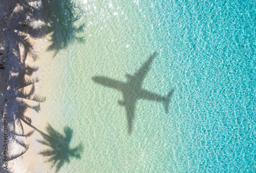 Fototapeta Naklejka Na Ścianę i Meble -  Nature of the beach and sea Summer with sunshine, sandy beaches, clear blue waters sparkling against the blue sky. On an island with good ecology and environment Background for summer vacation