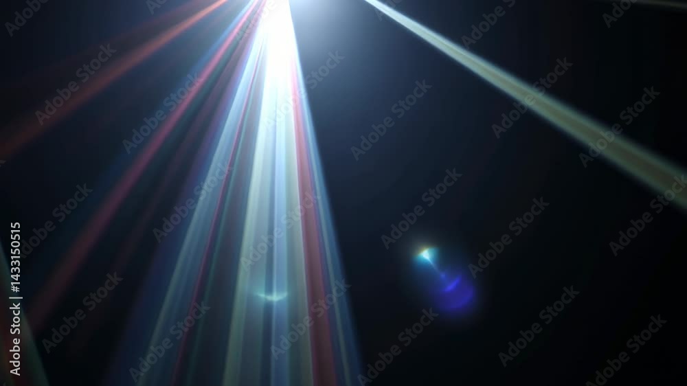 Multicolored Light Rays and Lens Flares on Dark Background Multicolored Light Rays and Lens Flares on Dark Background