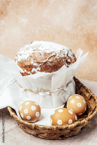 Traditional Easter cake with hand-painted daisy eggs on fabric. Homemade festive baked goods and decor...