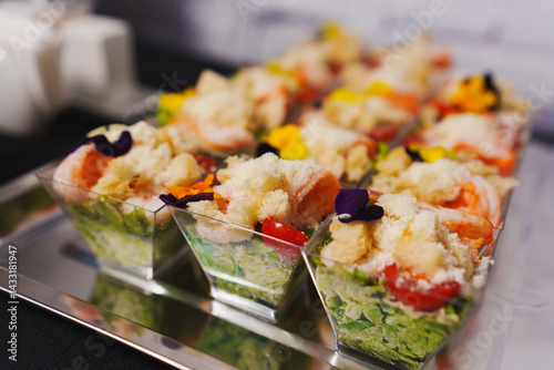 Obraz na płótnie tartlets with pate and salad garnished with flowers. Delicious appetizers. w salonie
