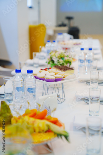 Obraz na płótnie Table served with fruits and desserts for the holiday. w salonie